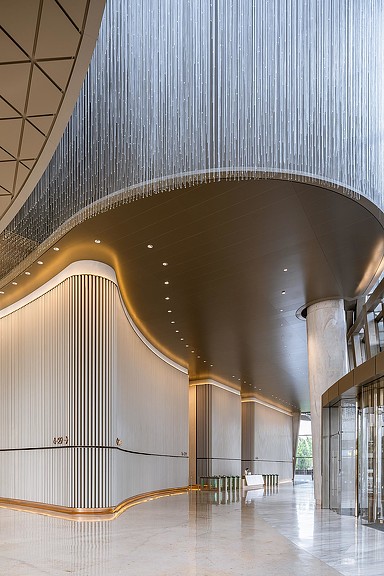 A large room with a large arched ceiling.